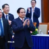 Thủ tướng Phạm Minh Chính đến dự hội nghị. (Ảnh: Dương Giang/TTXVN)