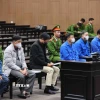 Các bị cáo tại phiên tòa ngày 16/1. (Ảnh: Minh Đức/TTXVN)