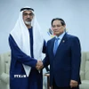 Thủ tướng Phạm Minh Chính gặp Hoàng Thái tử Abu Dhabi thuộc Các Tiểu vương quốc Arab Thống nhất (UAE) Khaled bin Mohamed bin Zayed Al Nahyan. (Ảnh: Dương Giang/TTXVN)