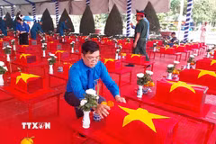 Lễ đón 173 hài cốt liệt sỹ quân tình nguyện và chuyên gia Việt Nam hy sinh tại Campuchia được tổ chức trang nghiêm tại Nghĩa trang Liệt sỹ Vĩnh Hưng – Tân Hưng, tỉnh Tây Ninh. (Ảnh: Bùi Giang/TTXVN)
