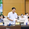 Bộ trưởng Bộ Nội vụ Nguyễn Tiến Hải thuyết trình về nội dung cơ bản của dự thảo. (Ảnh: Doãn Tấn/TTXVN)