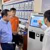 Chủ tịch UBND Thành phố Hồ Chí Minh Nguyễn Văn Được khảo sát việc vận hành chính quyền địa phương hai cấp tại phường Bà Rịa. (Ảnh: Huỳnh Sơn/TTXVN)