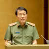 Đồng chí Lương Tam Quang, Ủy viên Bộ Chính trị, Bộ trưởng Bộ Công an giới thiệu hai Chuyên đề: “Nghị quyết về xây dựng xã hội kỷ cương, an toàn, văn minh, hài hòa, phát triển” và “Nghị quyết về Chiến lược An ninh quốc gia.” (Ảnh: Phương Hoa/TTXVN)