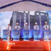 Lãnh đạo thành phố Đà Nẵng và các đại biểu thực hiện nghi thức nhấn nút khởi công dự án. (Ảnh: Trần Lê Lâm/TTXVN)