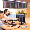 Khách hàng giao dịch tại Hội sở chính Công ty Chứng khoán Bảo Việt tại Hà Nội. (Ảnh: Trần Việt/TTXVN)