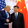 Tổng thống Mỹ Donald Trump (trái) và Chủ tịch Trung Quốc Tập Cận Bình. (Ảnh: Reuters/TTXVN)