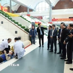 Diễn tập tình huống cấp cứu. (Ảnh: Lê Hảo/TTXVN)