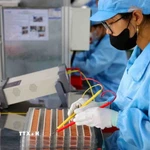 Sản xuất linh kiện điện tử. (Nguồn: TTXVN)