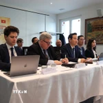 Các đại biểu tham dự hội thảo tại Phái đoàn thường trực Việt Nam tại Geneva. (Ảnh: Ngọc Ánh/TTXVN)