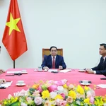 Thủ tướng Phạm Minh Chính điện đàm với Thủ tướng Singapore Lawrence Wong. (Ảnh: Dương Giang/TTXVN)