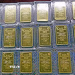 Vàng miếng SJC hiện giao dịch ở mức 143,8-146,8 triệu đồng/lượng (mua vào-bán ra). (Ảnh: TTXVN)