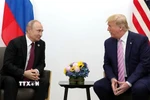 Tổng thống Mỹ Donald Trump (phải) trong cuộc gặp Tổng thống Nga Vladimir Putin tại Helsinki (Phần Lan) ngày 16/7/2018. (Ảnh: THX/TTXVN)