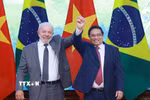 Thủ tướng Phạm Minh Chính hội kiến Tổng thống Brazil Luiz Inácio Lula da Silva. (Ảnh: Dương Giang/TTXVN)