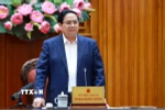Thủ tướng Phạm Minh Chính làm việc với lãnh đạo Bộ Quốc phòng về phát triển công nghiệp quốc phòng. (Ảnh: Dương Giang/TTXVN)