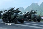 Các loại tên lửa phòng không tại lễ hợp luyện. (Ảnh: Trọng Đức/TTXVN)
