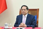 Thủ tướng Phạm Minh Chính điện đàm với Thủ tướng Malaysia Anwar Ibrahim. (Ảnh: Dương Giang/TTXVN)