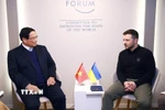 Thủ tướng Phạm Minh Chính gặp Tổng thống Ukraine Volodymyr Zelensky. (Ảnh: Dương Giang/TTXVN)