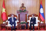 Tổng Bí thư Tô Lâm gặp nguyên Tổng Bí thư, Chủ tịch nước Lào Choummaly Sayasone. (Ảnh: Thống Nhất/TTXVN)