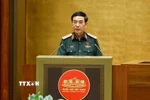Bộ trưởng Bộ Quốc phòng Phan Văn Giang trình bày Tờ trình dự án các luật liên quan đến quốc phòng-an ninh. (Ảnh: Doãn Tấn/TTXVN)