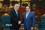 Thủ tướng Phạm Minh Chính tiếp ông Hồng Thiên Chúc, Chủ tịch Tập đoàn Texhong (Trung Quốc). (Ảnh: Dương Giang/TTXVN)