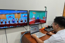 Hơn 3.200 điểm cầu truyền hình đã được VNPT triển khai kết nối về Trung ương để lãnh đạo cấp xã/phường có thể họp trực tuyến, tiết kiệm thời gian và đảm bảo công việc được liên tục cập nhật. (Ảnh: PV/Vietnam+)
