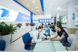 Tinh thần xuyên suốt của mô hình mới của VNPT là “lấy khách hàng làm trung tâm.” (Ảnh: PV/Vietnam+) 