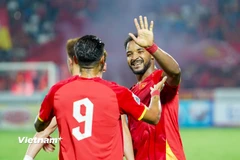 Xuân Son ghi bàn từ đường kiến tạo của Hoàng Hên (số 9) ở trận thắng 3-1 của đội tuyển Việt Nam trước Malaysia. (Ảnh: Việt Anh/Vietnam+)
