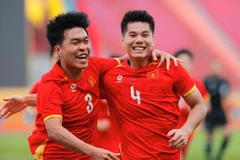 Đội tuyển U22 Việt Nam giành chiến thắng 2-0 trước Malaysia để giành quyền vào bán kết môn Bóng đá Nam SEA Games 33. (Ảnh: TTXVN)