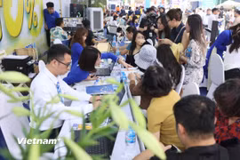 Hội chợ Du lịch quốc tế VITM Hà Nội luôn thu hút đông đảo sự quan tâm của công chúng. (Ảnh minh họa: Mai Mai/Vietnam+)