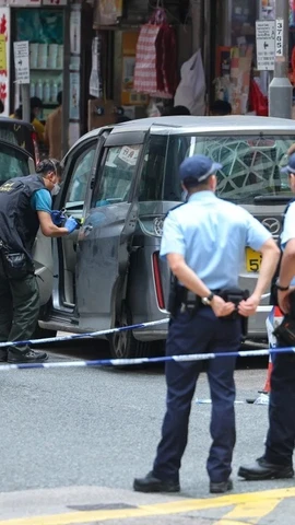 Cảnh sát Hong Kong làm nhiệm vụ tại hiện trường. (Ảnh: SCMP)