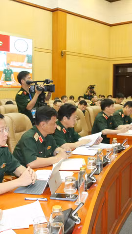 Các đại biểu dự hội nghị tại điểm cầu Bộ Quốc phòng. (Ảnh: PV/Vietnam+)
