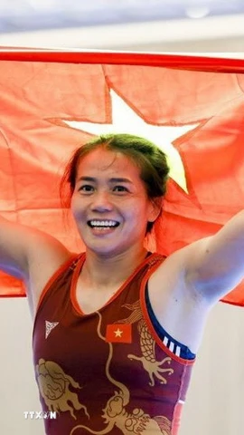 Nguyễn Thị Mỹ Hạnh - một trong những niềm hy vọng giành Huy chương Vàng tại SEA Games 33 của đội tuyển Vật Quốc gia. (Ảnh: Minh Quyết/TTXVN)