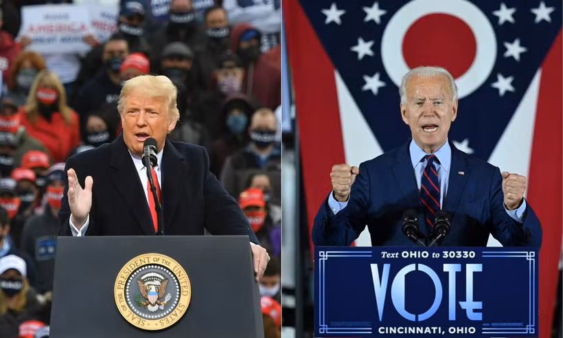 Tổng thống Mỹ Joe Biden (phải) và cựu Tổng thống Donald Trump. (Ảnh: AFP/TTXVN)