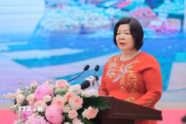 Bà Cao Xuân Thu Vân, Chủ tịch Liên minh Hợp tác xã Việt Nam, Phó Trưởng ban chỉ đạo Quốc gia về kinh tế tập thể phát biểu. (Ảnh: Lê Đông/TTXVN)