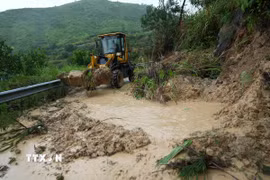Hiện trường vụ lở đất tại tỉnh Chiết Giang, Trung Quốc, ngày 12/7/2026. (Ảnh: THX/TTXVN phát)