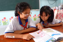 Học sinh xã biên giới Tân Hòa, tỉnh Tây Ninh. (Ảnh: Đức Hạnh/TTXVN)