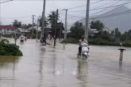Mưa lớn gây ngập lụt ở địa bàn xã Vĩnh Thạnh, thành phố Nha Trang, tỉnh Khánh Hòa. (Ảnh: Phan Sáu/TTXVN)