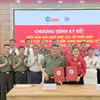 Trung ương Hội Chữ thập đỏ Việt Nam và Tổng công ty Công nghệ - Viễn thông Toàn cầu ký kết Biên bản ghi nhớ hợp tác về nghiên cứu và xây dựng phương án Nền tảng Nhân đạo số quốc gia. (Ảnh: PV/Vietnam+)