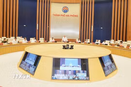 Phiên họp được kết nối trực tuyến đến 114 điểm cầu xã, phường, đặc khu trên địa bàn thành phố. (Ảnh: Minh Huệ/TTXVN)