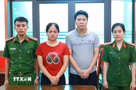 Bị can Lê Thanh Hiển và Đỗ Kim Chung tại Cơ quan cảnh sát điều tra. (Ảnh: TTXVN phát)