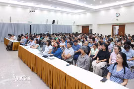 Đảng viên thuộc Đảng bộ Thông tấn xã Việt Nam tham dự Hội nghị trực tuyến tại điểm cầu trụ sở Thông tấn Quốc gia (5 Lý Thường Kiệt, Hà Nội). (Ảnh: Phạm Kiên/TTXVN)