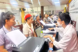 Thành phố Hồ Chí Minh khám tầm soát sức khỏe sinh sản miễn phí cho 35.000 nữ công nhân. (Ảnh: Thanh Vũ/TTXVN)