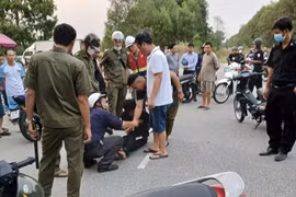 Nghi phạm trong vụ việc bị khống chế. (Ảnh: TTXVN phát)