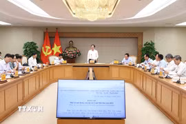 Phó Thủ tướng Hồ Quốc Dũng chủ trì họp về một số nội dung của dự án Luật Đất đai (sửa đổi). (Ảnh: An Đăng/TTXVN)