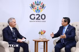 Nhân chuyến tham dự Hội nghị Thượng đỉnh G20 tại Nam Phi, chiều 22/11/2025 (giờ địa phương), Thủ tướng Phạm Minh Chính gặp Thủ tướng Canada Mark Carney. (Ảnh: Dương Giang/TTXVN)