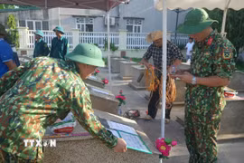 Mỗi mẫu hài cốt đều được gắn với một mã số riêng, kèm theo đầy đủ thông tin, hình ảnh và hồ sơ liên quan để phục vụ công tác giám định, đối chiếu sau này. (Ảnh: Khiếu Tư/TTXVN)