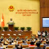 Quốc hội biểu quyết thông qua Luật sửa đổi, bổ sung một số điều của Luật Ngân hàng Nhà nước Việt Nam, Luật Phòng, chống rửa tiền và Luật Các tổ chức tín dụng. (Ảnh: Doãn Tấn/TTXVN)