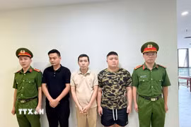 Các đối tượng bị triệu tập. (Ảnh TTXVN phát)