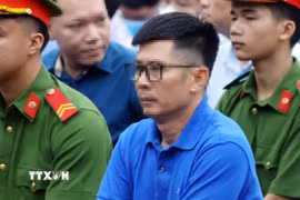 Bị cáo Nguyễn Duy Hưng, cựu Chủ tịch Hội đồng quản trị Tập đoàn Thuận An tại phiên tòa xét xử. (Ảnh: Phạm Kiên/TTXVN)