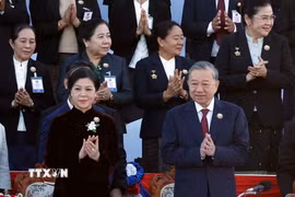 Tổng Bí thư Tô Lâm và Phu nhân dự Lễ kỷ niệm 50 năm Quốc khánh Lào và 105 năm Ngày sinh Chủ tịch Kaysone Phomvihane. (Ảnh: Thống Nhất\/TTXVN)